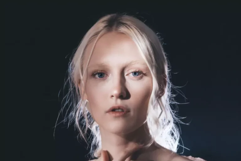 center woman on black background